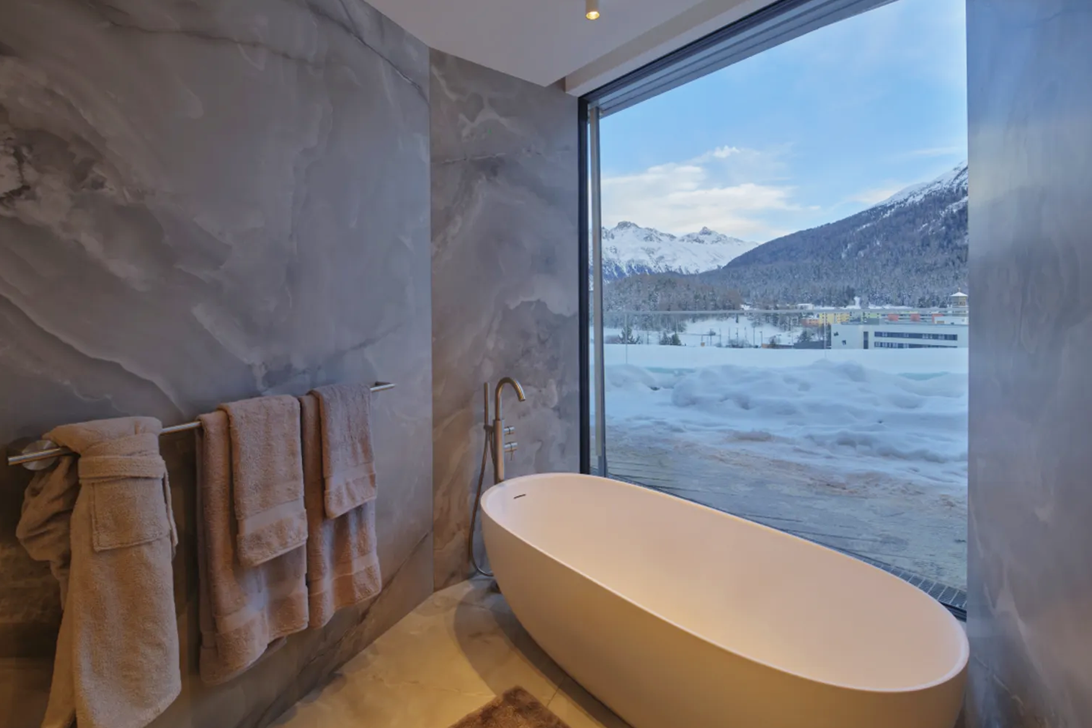 Stunning Penthouse with Panoramic Lake Views in the Heart of St. Moritz